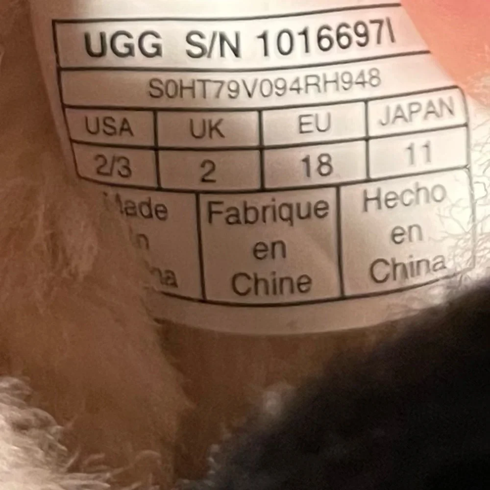 UGG Black and Cream Sheepskin Footwear
